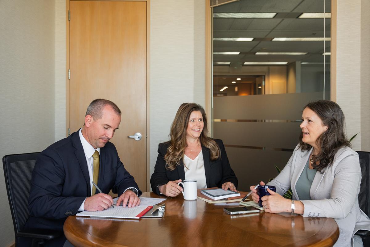 VJG attorneys Nate Schmutz, Marlo DeLange, and Erica Doctor